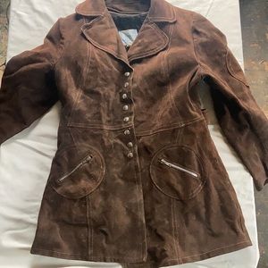 Great looking brown leather jacket.
